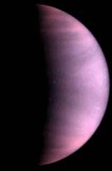 a purple planet in orbit around saturn